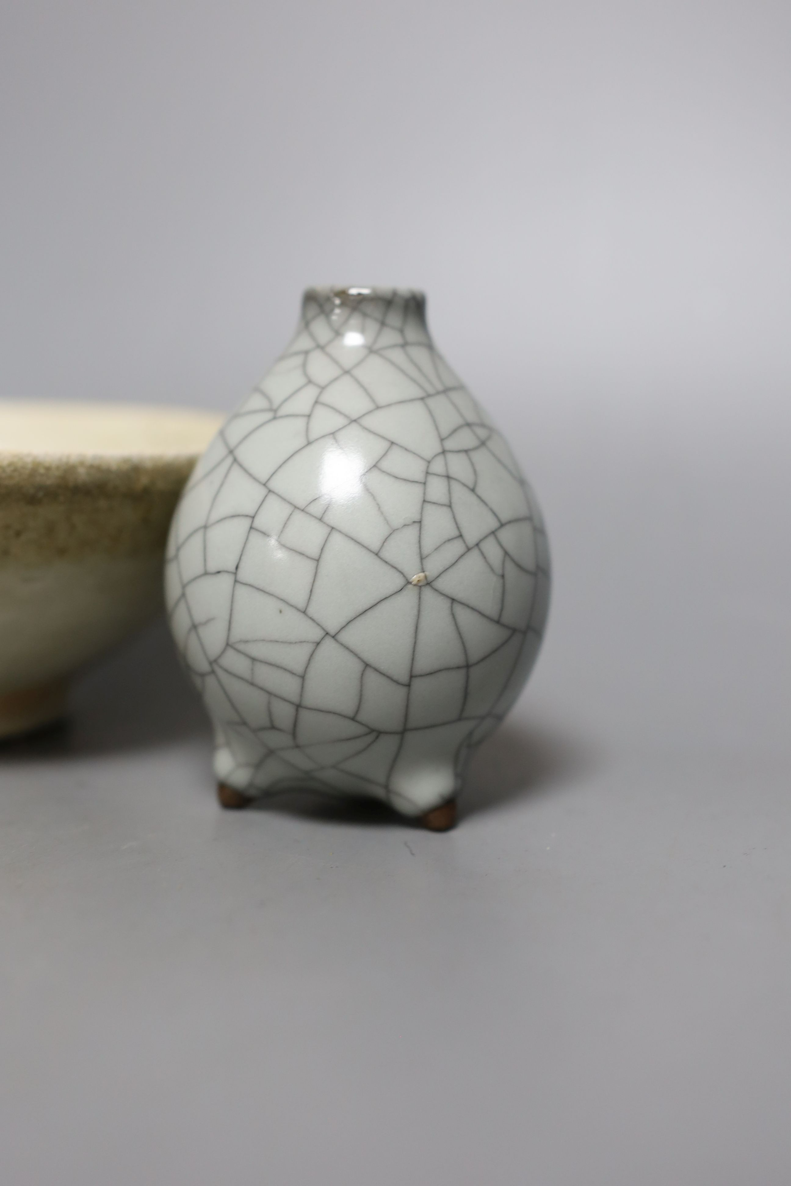 An 18th century Chinese export saucer dish, crackle glaze vase and a Qingbai bowl, diameter 15cm